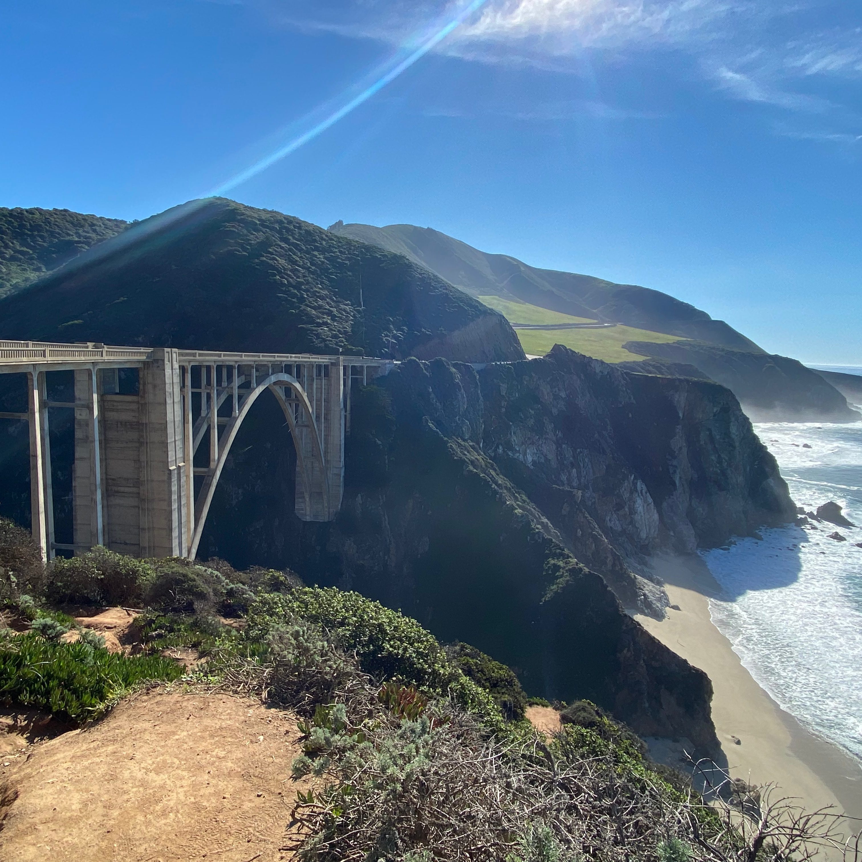 Big Sur Bridge ocean with sun